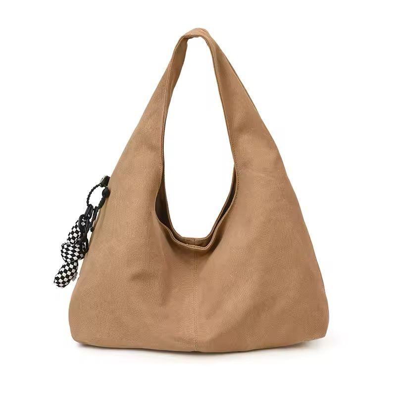 Bolso de hombro con detalle de lazo